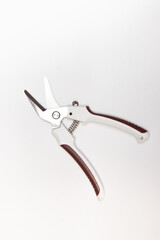 Leather scissors isolated on a white background