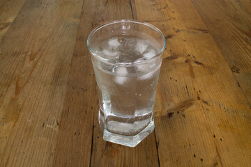 Refreshing glass of soda with ice.
