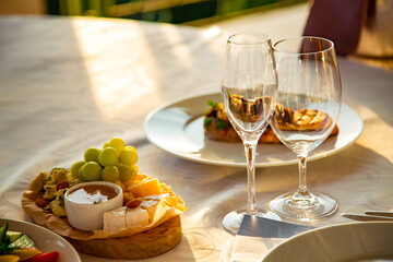 beautiful table setting, with dishes, food, in a summer cafe