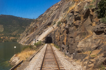 Train Railroad in The Valley of the River Douro, Portugal - Port Wine Vineyards Region with...