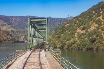 Iconic Railroad Iron Bridge in The Valley of the River Douro, Portugal - Port Wine Vineyards Region...