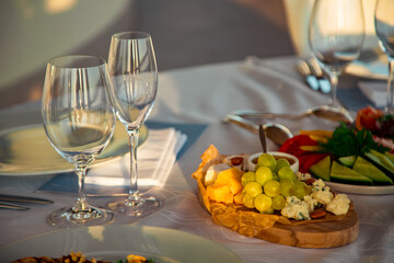 beautiful table setting, with dishes, food, in a summer cafe