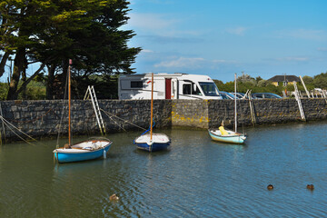 Three Sailing Boats Mored Up 