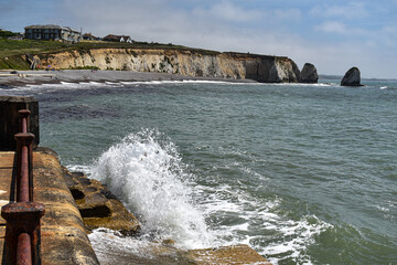 Beach Waves Crashing Against Walls 