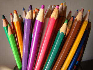 Fototapeta premium Colorful pens and pencils on a table