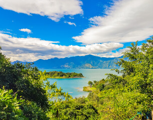 Blue Lake Atitlan surrounded by Volcanoes in Guatemala