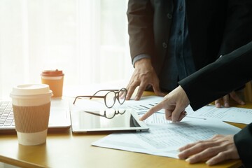 Young business working on desk in office