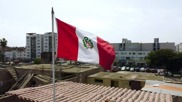 Peruvian flag waving in the wind. Slow motion