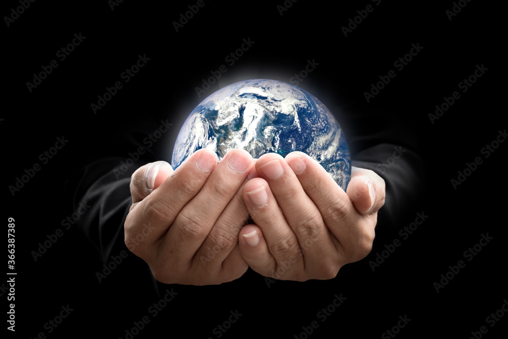 Canvas Prints environment concept. earth in hands on black background. elements of this image furnished by nasa