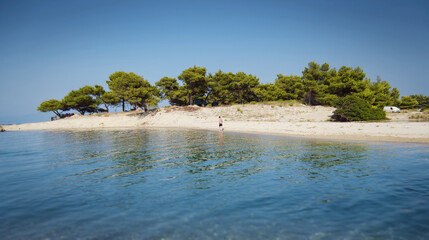 Man alone on a sandy island