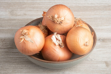 Sweet Southern-Grown Onions On A White Panel Board