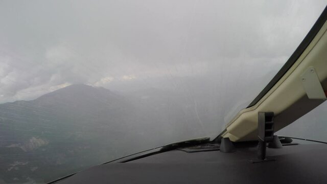 Rain on Aircraft Windshield during Flight, Pilot Point of View.