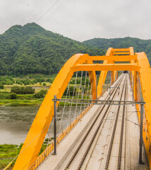 Top view of arched railroad bridge