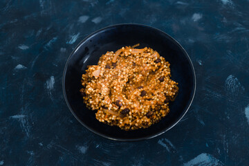 plant-based food, vegan buckwheat with beans in tomato sauce