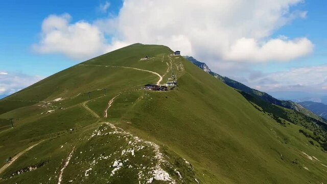 This stock video features aerial drone footage of the beautiful mountains and hills of Monte Baldo in Lessinia, Italy.