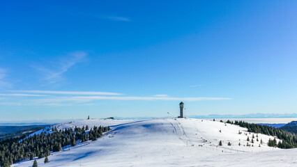 Winter Feldberg Ski Resort in Black Forest of German, tower at rear of treeless area