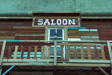 Fototapeta na wymiar saloon terrace of the old wooden houses-Vintage filter