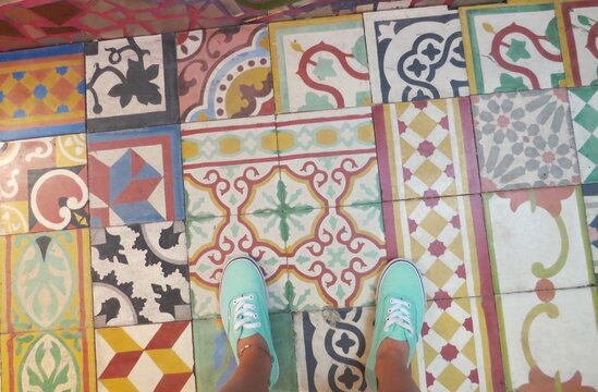Standing on colorful tiled floor with fun shoes