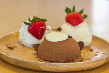 Chocolate cake with ice cream and strawberry