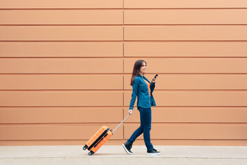 Travel Woman with Luggage Suitcase Checking Smartphone