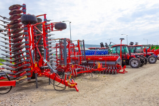 Kyiv, Ukraine - June 16, 2020: Tractor and Unia cultivator on the field for minimum-tillage technology at Kyiv, Ukraine