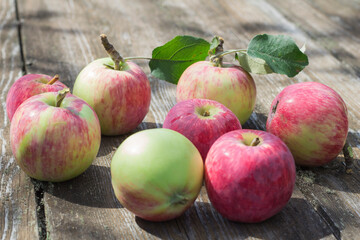 red apples on wooden table