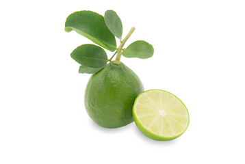 A fresh green lime and a piece of slice lime