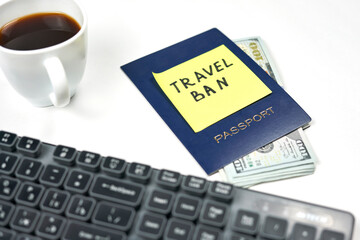 A passport and sticker with words - Summer holidays cancelled. Effect of COVID-19 and coronavirus on travel industry. Flights cancellations due to pandemic