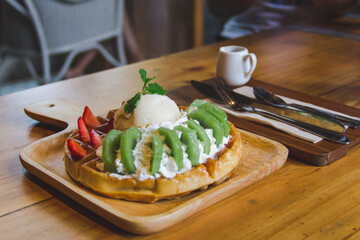 Ice cream and wafers.topped with fruit