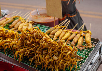 Squid grilled, junk food of Thailand.
