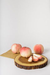 honey peach in wooden bowl