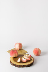 honey peach in wooden bowl