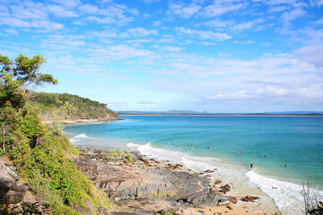 People surfing in Noosa, Sunshine Coast, Australia