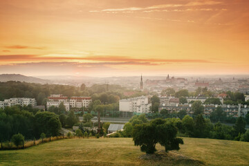 Fototapeta na wymiar View on Krakow city landscape at the sunset from the Krakus Mound, legendary cult place in Poland