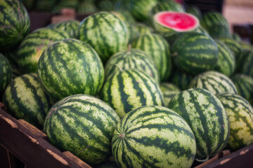 Watermelons are sold at the farmers ' market. Fresh watermelons close-up. Selective and soft focus. The season of watermelons.