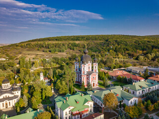 Flight over a christian monastery surrounded by autumn forest. Kurky monastery, Moldova republic of. © Igor Syrbu