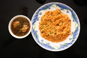 Schezwan fried rice with Manchurian