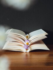 Open book with flowers in it