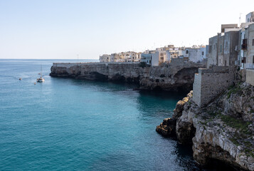 View of Polignano a mare - picturesque little town on cliffs of the Adriatic Sea. Apulia, Southern Italy