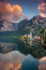 Hallstatt, Austria. Image of famous alpine village Hallstatt at dramatic summer sunset.