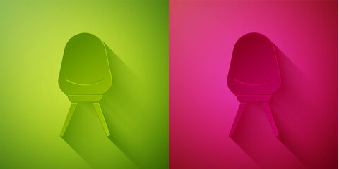 Paper cut Office chair icon isolated on green and pink background. Paper art style. Vector Illustration.