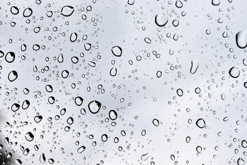Raindrops on the glass. Rainy weather. Autumn mood.