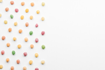 Close up of colorful fruit caramel, hard sugar candies or boiled sweets isolated on white background. 