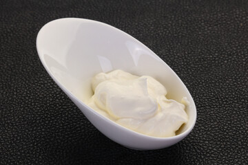 Sour cream in the bowl