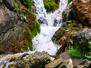 Foamy Valley Waterfall in Bucegi mountains accessible from Busteni town. Long exposure picture of a waterfall.