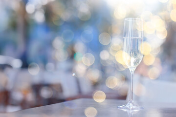 glass white wine restaurant interior, abstract evening dinner with alcohol at the bar