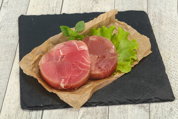 Raw tuna round steak for grill