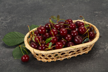 Sweet ripe cherry with leaves