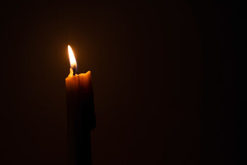 candles that are lit in the dark