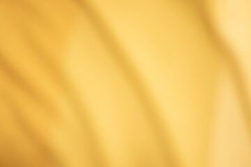 Golden yellow cotton fabric for a soft and smooth background. Elegant graphics.